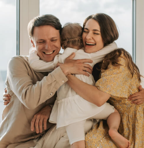 a family hugging together